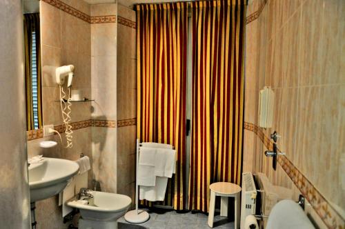 Koupelna v ubytování Hotel Rio