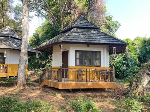 a small house in the middle of a forest at Moonlit Garden Koh Chang in Ban Dan Kao