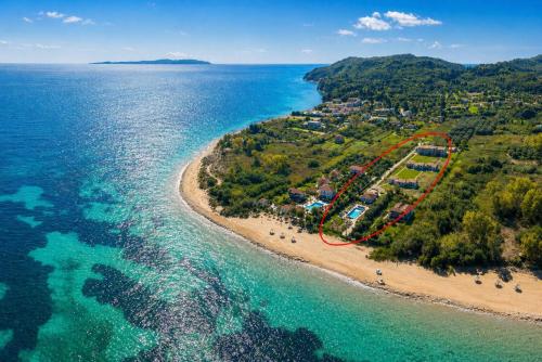 an aerial view of a resort on a beach at Koulouris Beach Hotel in Kavos