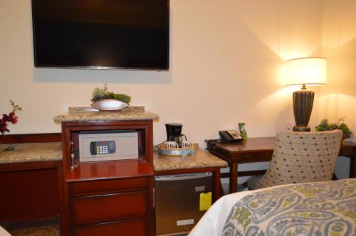 Hotel HBlue Centroにあるテレビまたはエンターテインメントセンター