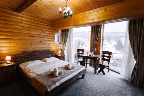 Postel nebo postele na pokoji v ubytování Hotel Marilen
