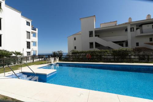 Bright apartment with seaview and a pool