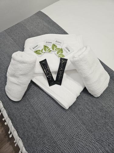 a pair of white socks with the letter v on them at El capricho in Fuengirola