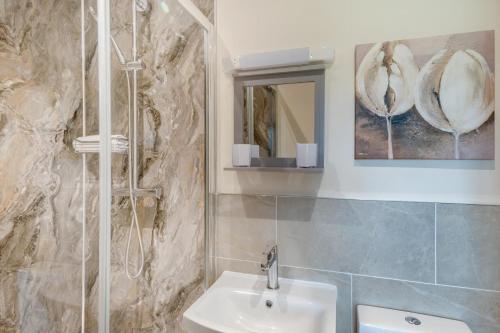 a bathroom with a sink and a shower at 3 Bed in Belford oc-79178 in Belford