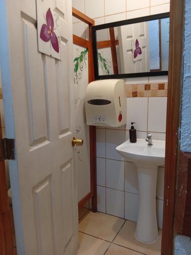 a bathroom with a toilet and a sink at Hospedaje por 7 días 15 dias o Mes in La Serena