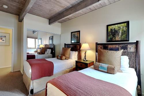 a hotel room with two beds and a room at Timberline Condominiums 3 Bedroom Deluxe Unit D2E in Snowmass Village