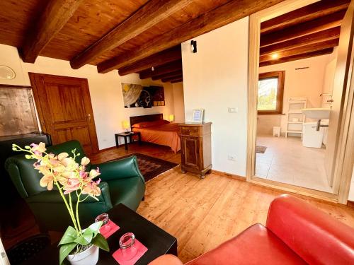 a living room with a couch and a table at Villa Saten in Pavia dʼUdine