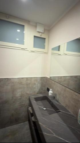 a bathroom with a sink in a room at Alloggio del Trap in Ferentillo