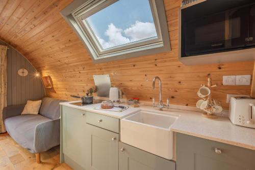a kitchen with a sink and a window at 1 Bed in Barnacre oc-b34348 in Catterall