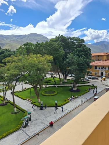 a view of a park with trees and people at Hotel las vegas in Huánuco