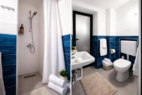 a bathroom with a white toilet and a sink at OM Center Apartments Tirana in Tirana
