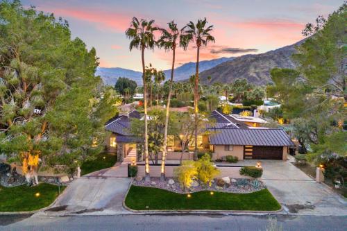 an aerial view of a home with palm trees at Desert Solstice in Palm Springs