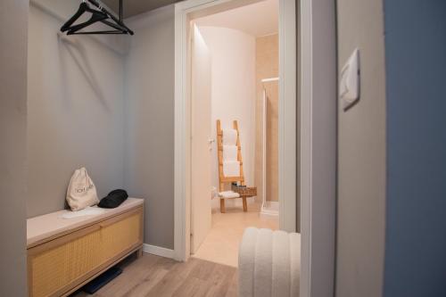 a bathroom with a dresser and a mirror at Vlt 901 in Brescia