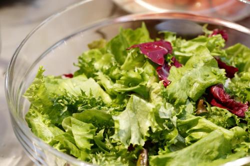 a salad in a glass bowl on a table at Hotel Monte Hermana Kobe Amalie in Kobe