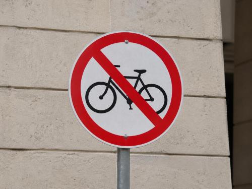 a no bike sign in front of a wall at Pensión Atenea & Via Romana - Grupo Arcanos in Caldas de Reis