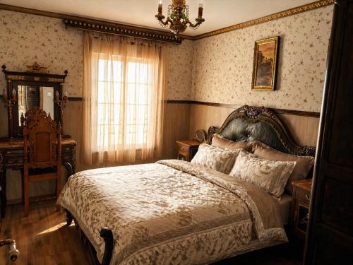 a bedroom with a bed and a window at Luxury art Apartamenty in Pineda de Mar
