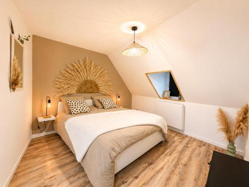 Llit o llits en una habitació de Au Petit Wissant