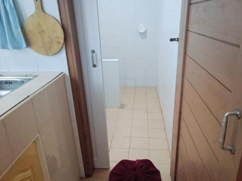 a bathroom with a sink and a shower stall at Little house in Koh Samui