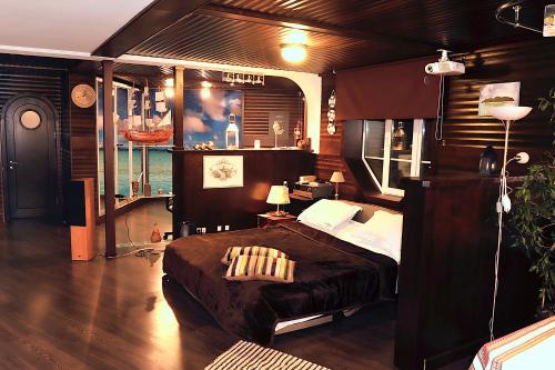 a bedroom with a large bed in a room at The Sky Loft in Kyiv