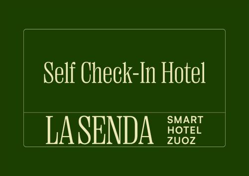 a green sign with the words self check in hotel la grenada at La Senda Smart Hotel Zuoz in Zuoz