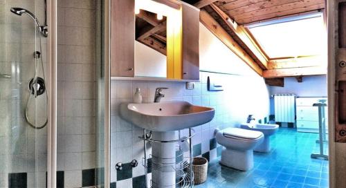 a bathroom with a sink and a toilet at Anita in Verbania