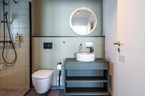 a bathroom with a sink and a toilet at stuub saig in Lenzkirch