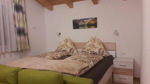 Postel nebo postele na pokoji v ubytování Chalet Sunnseitn