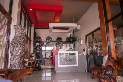 a room with a store with a refrigerator in it at Apihap Hotel Daraga Albay in Locsin