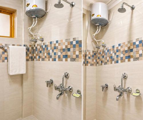 a shower with two faucets in a bathroom at The Ladakh Residency Kargil in Kargil
