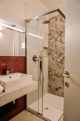 a bathroom with a shower and a sink at Emilia381 Suite in Anzola dell'Emilia