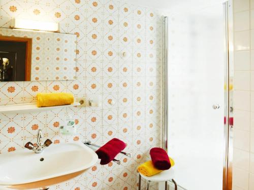 a bathroom with a sink and a shower at Farmhouse in Kössen near Kitzbühel Alps in Kössen