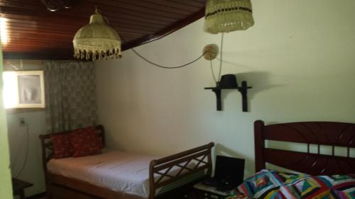Ein Bett oder Betten in einem Zimmer der Unterkunft Apartamento Temporada Cabo Frio