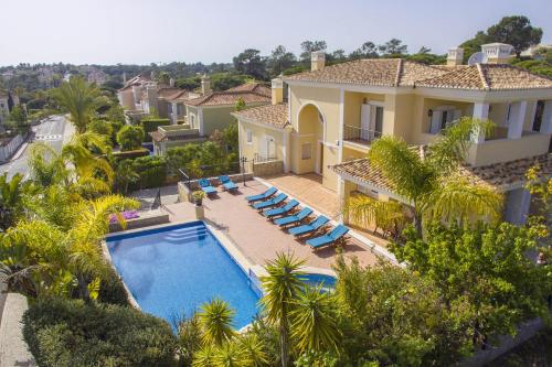 an aerial view of a villa with a swimming pool at Villa Valentina by Algarve Holidays in Almancil