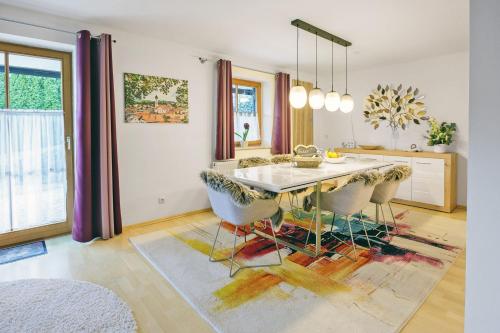 a dining room with a table and chairs at Freigeist in Nesselwang