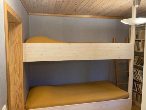 a couple of bunk beds in a room at Hemsö Hideaway in Kojbacken