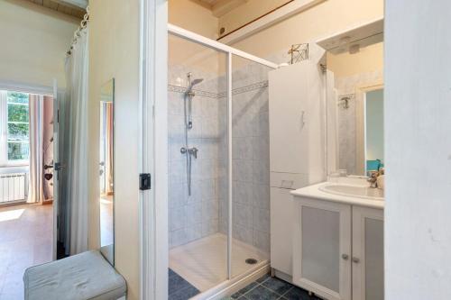 a bathroom with a shower and a sink at Chambres en Charente Maritime in Loiré-sur-Nie