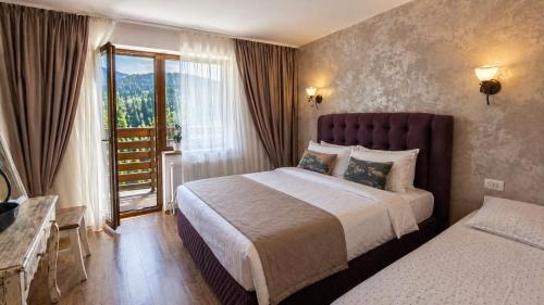 Postel nebo postele na pokoji v ubytování Inspire View - Boutique