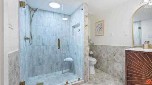 a bathroom with a shower and a toilet at Swiftie Suite Beach Getaway Studio in Santa Rosa Beach