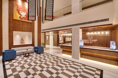 a lobby with a checkered floor at Lemon Tree Premier, Biratnagar, Nepal in Biratnagar