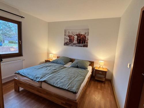 Llit o llits en una habitació de Der Highlander