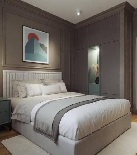 a bedroom with a large white bed in it at Aureline Hill in Baku