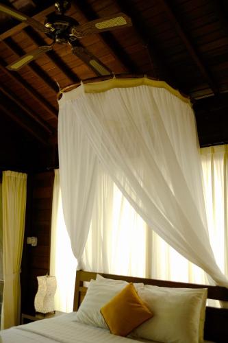 Ένα ή περισσότερα κρεβάτια σε δωμάτιο στο Prama House
