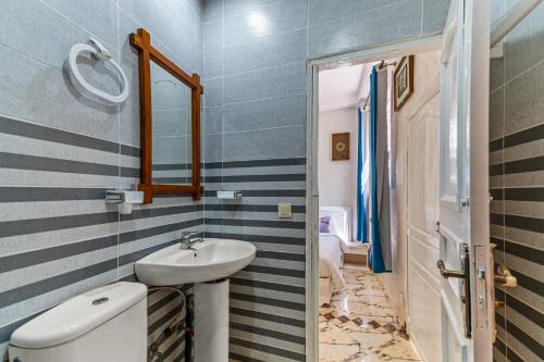 a bathroom with a sink and a toilet at Riad Rêve D'Ourika in Ourika