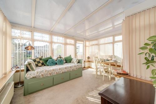 a bedroom with a bed in a room with windows at 2 Bed in Dalrymple oc-b40270 in Dalrymple