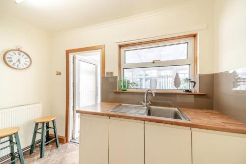 a kitchen with a sink and a window at 2 Bed in Dalrymple oc-b40270 in Dalrymple