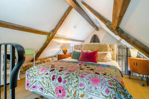 a bedroom with a large bed in a attic at 1 Bed in Alhampton oc-t42458 in Bathampton