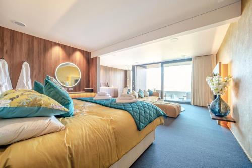 a large bedroom with two beds and a mirror at 1 Bed in Oban oc-t41733 in Acharra