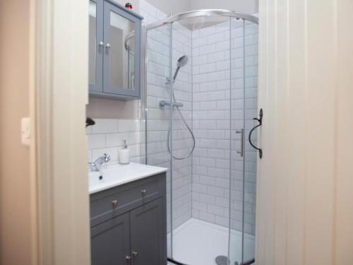 a bathroom with a shower and a sink at 2 Bed in Richmond oc-74284 in Reeth