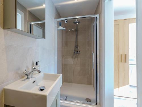 a bathroom with a sink and a shower at 1 Bed in Wadhurst oc-79495 in Ticehurst