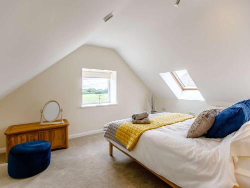 a bedroom with a bed with a teddy bear on it at 1 Bed in Corsham oc-83690 in Box